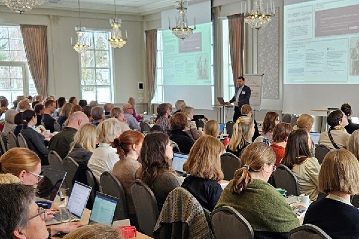 Speaker in front of audience