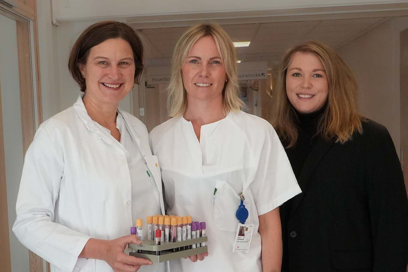 Three women with blood samples